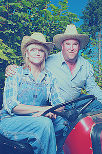 stock photo of farmers on a tractor